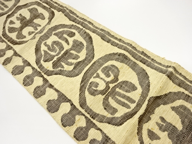 手織り真綿紬丸に抽象模様織出し名古屋帯